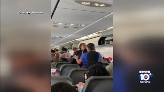 Cellphone video shows disturbance on Frontier flight that led to arrest [upl. by Rabaj229]