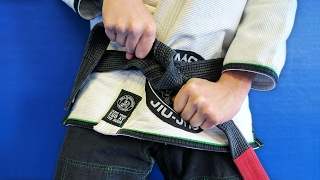 How to Tie a Brazilian Jiu Jitsu Belt  LiveTheMachLife [upl. by Aynotan]