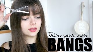 How To Trim Your Own Bangs [upl. by Nnyla95]