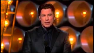 John Travolta Calls Idina Menzel quotAdele Dazeemquot at Oscars [upl. by Ynnij]