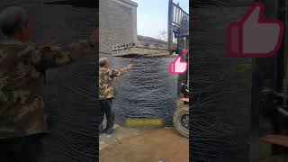 The process of compressing steel wire with the cement board on a forklift [upl. by Atiuqahs]