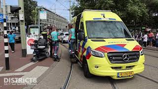 Scootmobiel in botsing met tram Hobbemaplein Den Haag [upl. by Atsiuqal]