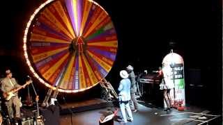 Elvis Costello  Antoine de Caunes spinning the wheel Olympia [upl. by Chryste]