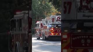 Tower ladder 57 and engine 198 responding to a house fire [upl. by Yarised]