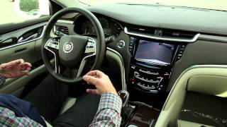 How To Use the Cadillac XTS or CTS Auto Park Assist [upl. by Dahcir]