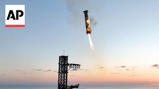 WATCH SpaceX catches Starship rocket booster back at the launch pad [upl. by Pride923]