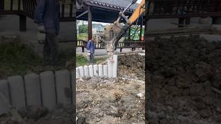 Driving concrete piles using heavy equipment [upl. by Hudson]