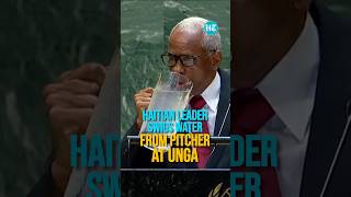 Thirsty Haitian Leader Swigs Water From Pitcher Drenches Himself At UNGA [upl. by Alfonzo]