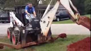 Digging sewage with bobcat 863 backhoe 811 attachment [upl. by Laurinda]