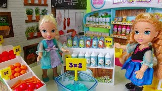 Elsa and Anna toddlers go shopping at the supermarket and buy toys [upl. by Burchett591]