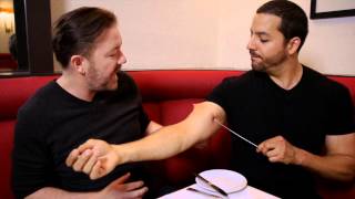 Ricky Gervais Sees Pierced Arm Real or Magic  David Blaine [upl. by Edurtreg]