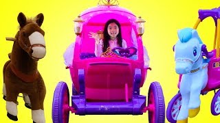 Emma Drives Disney Princess Carriage Rideon Toy [upl. by Henriha]