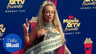 Tana Mongeau dazzles in dollar bill dress on MTV red carpet [upl. by Eulau]