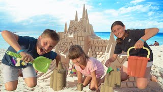 We Play on the Beach Making Beautiful Sand Castles [upl. by Duarte]