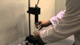 Perfume Spray Pump Crimper  Bench Mounted  How to use demonstration [upl. by Nujra]