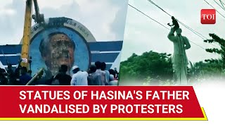 Hasina amp Family Humiliated Bangladesh Protesters Bulldoze amp Destroy Statues Of Ousted PMs Father [upl. by Lairbag]