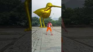 Kick a ball and smash the outdoor longbilled bird gold statue original gold statue longbilled [upl. by Dorreg]