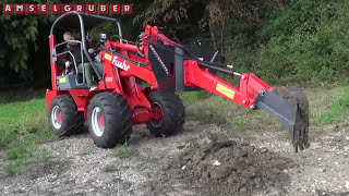 Baggerarm für Hoflader  Amselgruber Landtechnik  Fuchs F 1244 Hoflader mit Dominator Baggerarm [upl. by Hallagan]