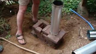 greenhouse construction  rocket mass heater how to tutorial [upl. by Olds]