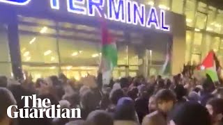 Mob storms Russian airport in search of passengers from Israel [upl. by Pritchett39]