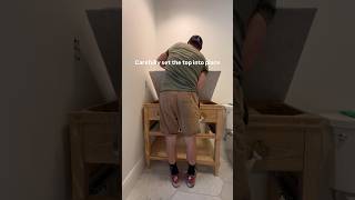 Attaching counter to vanity base diy bathroomremodel renovation home bathroom shorts [upl. by Alliuqat606]