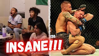 HILARIOUS Reaction to Dustin Poirier and Michael Chandlers INSANE WAR at UFC 281  Throwback fight [upl. by Kahl418]