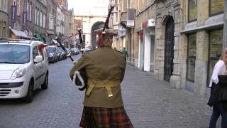 Marching with the Bagpipes toward the Menin Gate Ypres [upl. by Norihs]