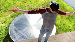 100 Layers Saran Wrap Trampoline LEAP OF FAITH [upl. by Ahsinat]