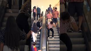 Slapping prank 😜😱 Escalator comedy reaction reaction fun funnycomedy [upl. by Ferro]