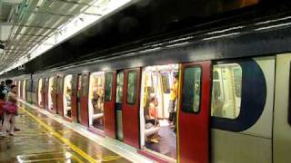 The Northbound SP1900 EMU at the Kowloon Tong Station with squally showers [upl. by Neersan441]