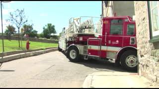 Tiller Truck Makes Tight Turn Into Alleyway [upl. by Akeenahs]