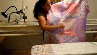 Longarm Machine Quilting Loading your quilt [upl. by Callean55]