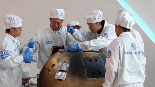 Moon sample container removed from Change6 capsule by researchers [upl. by Angelica]