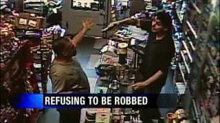 Store Clerk Pulls Gun On Armed Robber [upl. by Akins]