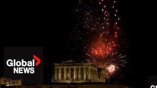 New Years 2024 Athens Acropolis illuminated by colourful fireworks display [upl. by Sandi]