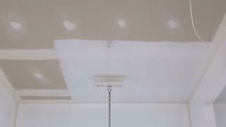 How To Paint A Ceiling  How to paint a ceiling using a roller [upl. by Anirtak]