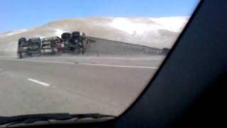 Semi truck gets blown over by Wyoming wind [upl. by Akinej]