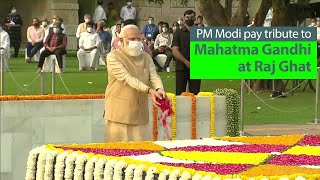 PM Modi pay tribute at the Samadhi of Mahatma Gandhi at Raj Ghat in Delhi  PMO [upl. by Delfeena]