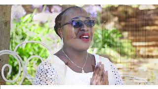 Nakuabudu Yesu katika Hostia  Traditional Catholic Hymn  Sung by Felistas Mburugu [upl. by Justinn84]