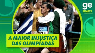 HOMEM INVADE MARATONA E TIRA OURO DE MARATONISTA BRASILEIRO EM 2004  shorts  geglobo [upl. by Lrad967]