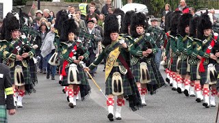 Huntly and District Pipe Band marching to the 2022 Braemar Gathering in Royal Deeside Scotland [upl. by Sivra]