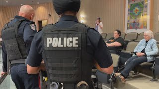 Police called public barred from city hall as councillors criticized over homelessness lawsuit [upl. by Wynn153]