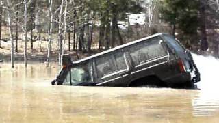 modified jeep cherokee snorkels very deep water and floats Jakes Place [upl. by Zahc]