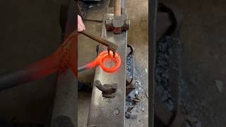 Blacksmith forges a loop curtain pole blacksmith makingvideos handmade shortswithcamilla [upl. by Bowen]