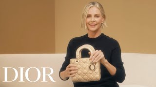 Whats in Charlize Therons Lady Dior bag  Episode 18 [upl. by Eisned]