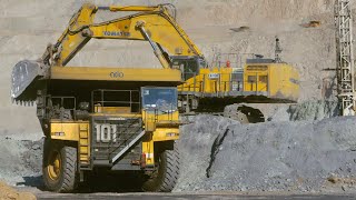 Komatsu 1250 Excavator and 100Ton Dump Truck in Action with Caterpillar Grader Support [upl. by Retswerb]