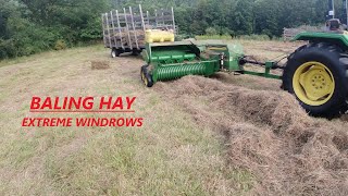 Square Baling Hay  Extreme Windrows  JD 5055D 348 Baler amp 42 Pan Kicker [upl. by Lacy10]