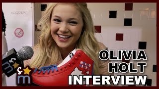 Olivia Holt Talks quotI Didnt Do Itquot amp Shows Off Roller Skates [upl. by Kelwunn605]