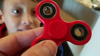 World famous fidget spinner challenge  spinning on tile floor With toddler Gabriella crying [upl. by Kalvin53]