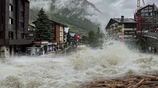 In Europe now Switzerland river overflow causes severe flooding in Zermatt [upl. by Yenaffit]